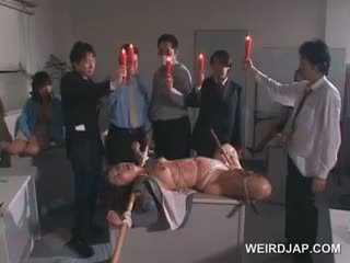 Tied Up Asian Slave Gets Wax Dripped On Her Sexy Body