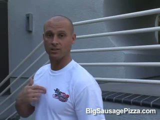 Hot brunette does blowjob for guy with pizza on cock while kneeling